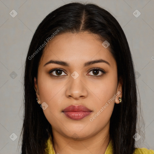 Joyful latino young-adult female with long  brown hair and brown eyes