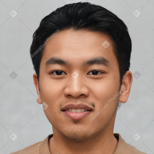 Joyful asian young-adult male with short  black hair and brown eyes