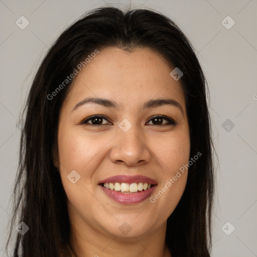 Joyful latino young-adult female with long  brown hair and brown eyes