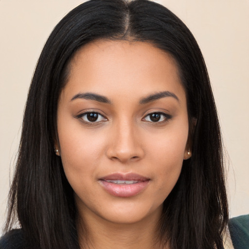 Joyful white young-adult female with long  black hair and brown eyes