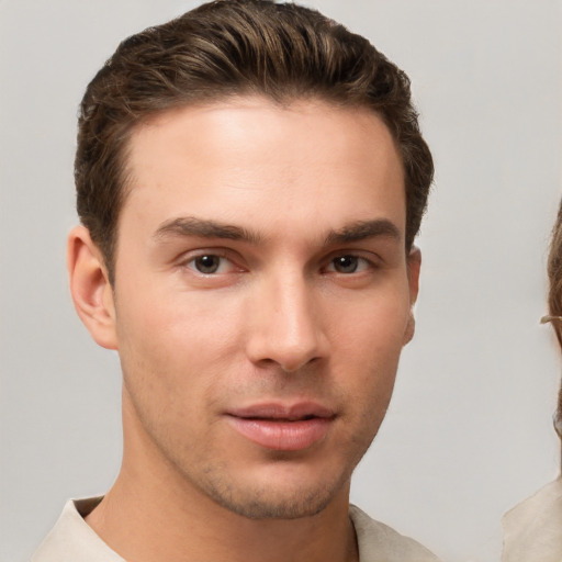 Neutral white young-adult male with short  brown hair and brown eyes