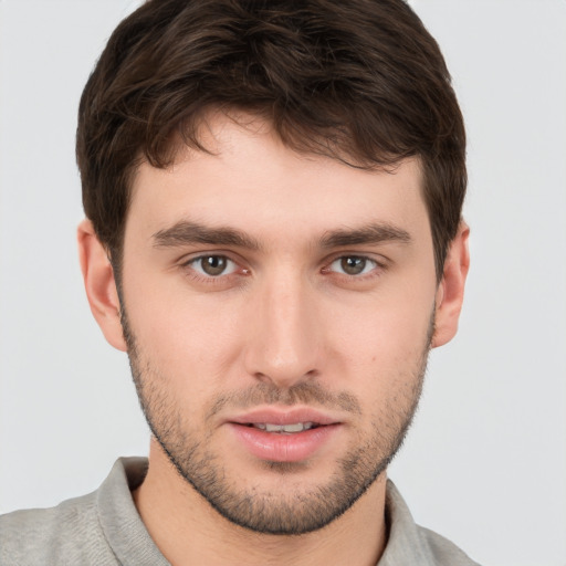 Neutral white young-adult male with short  brown hair and brown eyes