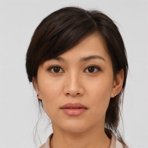 Neutral asian young-adult female with medium  brown hair and brown eyes