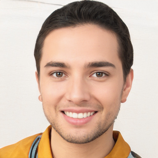 Joyful white young-adult male with short  brown hair and brown eyes