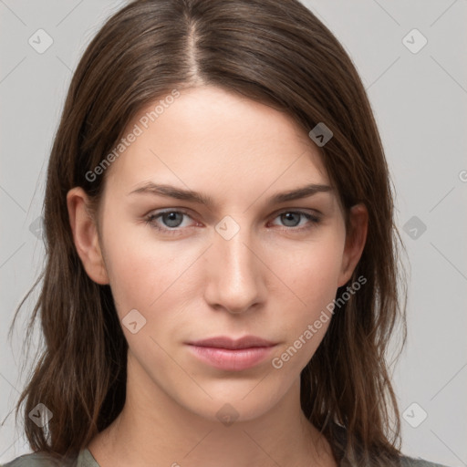 Neutral white young-adult female with medium  brown hair and brown eyes