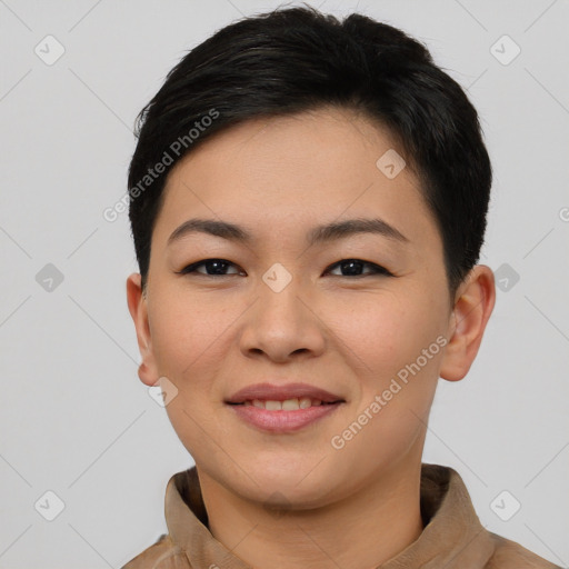 Joyful asian young-adult female with short  brown hair and brown eyes