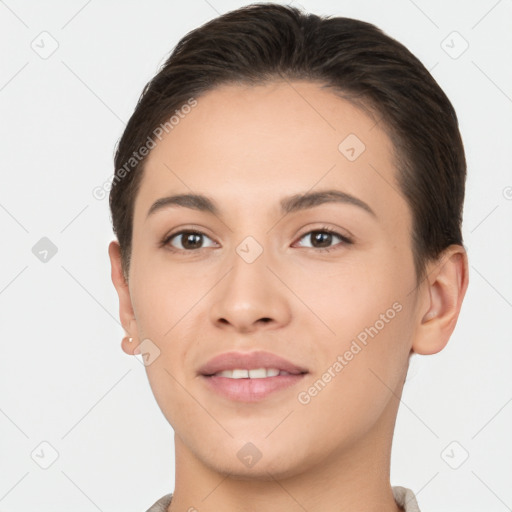 Joyful white young-adult female with short  brown hair and brown eyes