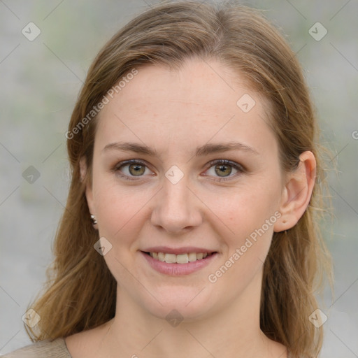 Joyful white young-adult female with medium  brown hair and green eyes