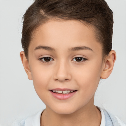 Joyful white child female with short  brown hair and brown eyes