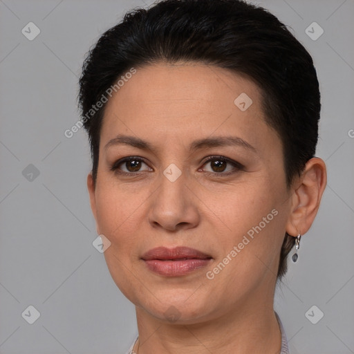 Joyful white adult female with short  brown hair and brown eyes