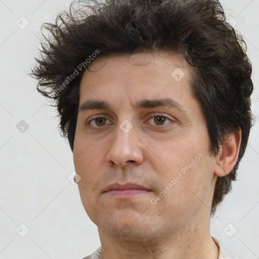 Neutral white adult male with short  brown hair and brown eyes