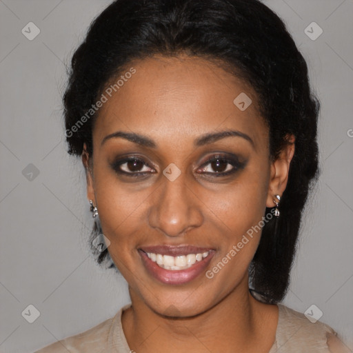 Joyful black young-adult female with medium  black hair and brown eyes