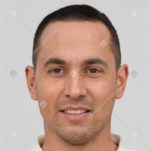 Joyful white young-adult male with short  brown hair and brown eyes