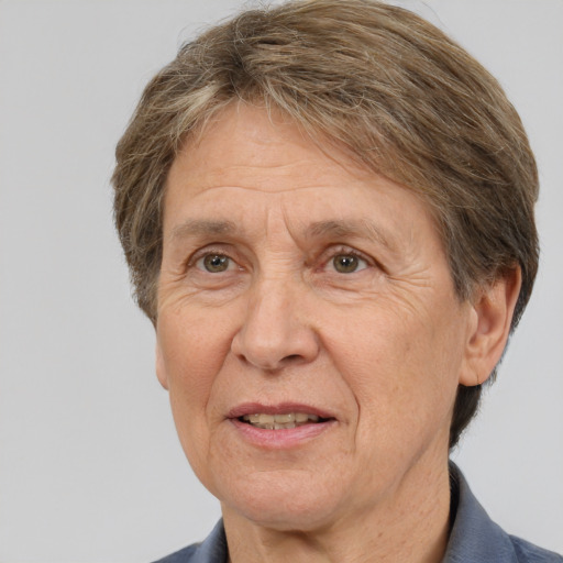 Joyful white middle-aged female with short  brown hair and brown eyes