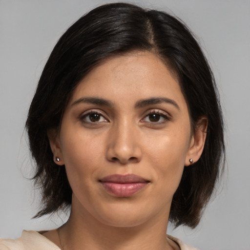 Joyful asian young-adult female with medium  brown hair and brown eyes