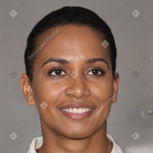 Joyful black young-adult female with short  brown hair and brown eyes