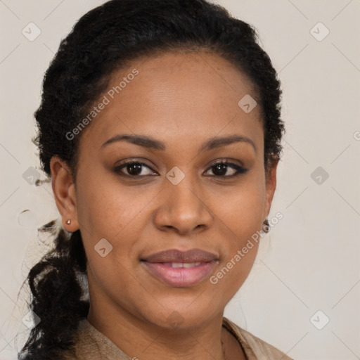 Joyful black young-adult female with long  brown hair and brown eyes
