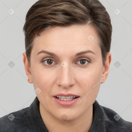 Joyful white young-adult female with short  brown hair and brown eyes