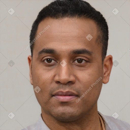 Neutral latino young-adult male with short  black hair and brown eyes