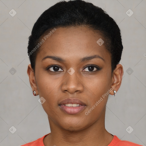 Joyful black young-adult female with short  black hair and brown eyes