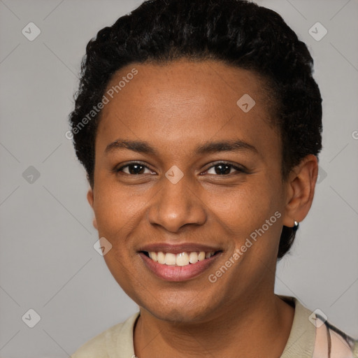 Joyful black young-adult female with short  black hair and brown eyes