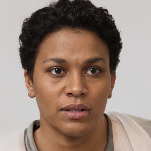 Neutral black young-adult female with short  brown hair and brown eyes