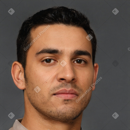 Neutral latino young-adult male with short  brown hair and brown eyes