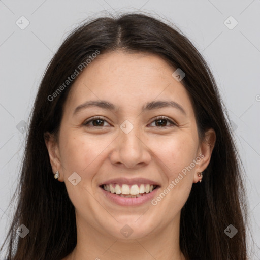 Joyful white young-adult female with long  brown hair and brown eyes