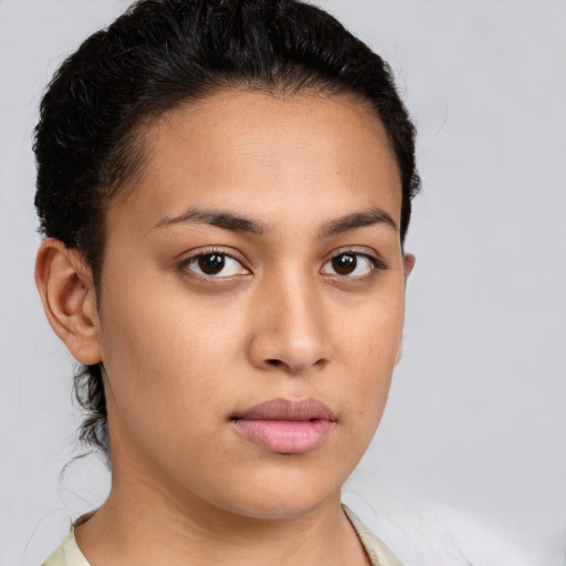 Neutral latino young-adult female with short  brown hair and brown eyes