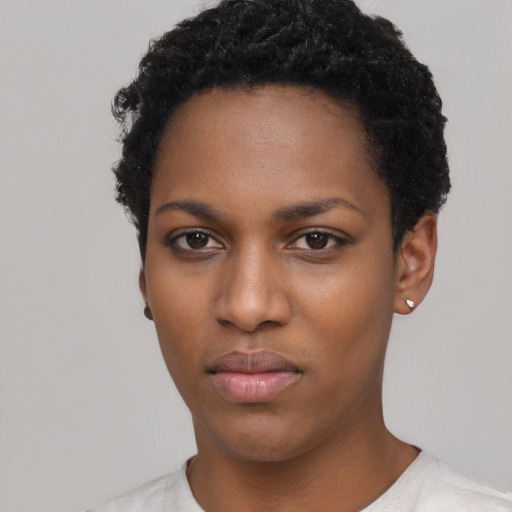 Neutral black young-adult female with short  black hair and brown eyes