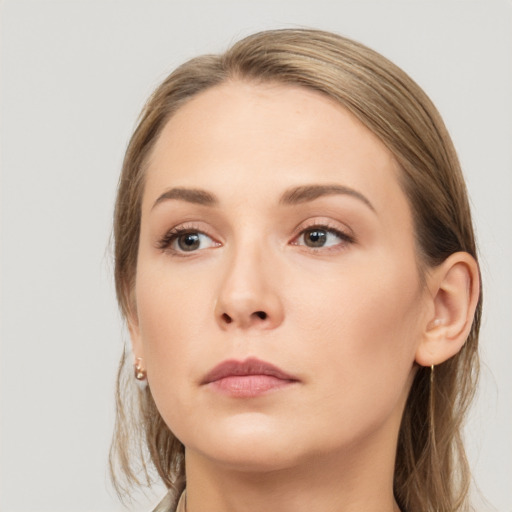 Neutral white young-adult female with long  brown hair and grey eyes