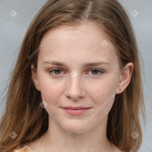 Joyful white young-adult female with medium  brown hair and blue eyes