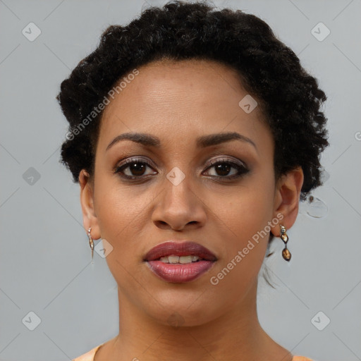 Joyful black young-adult female with short  brown hair and brown eyes