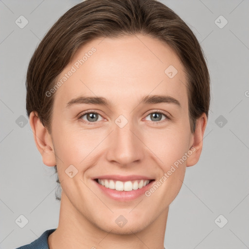 Joyful white young-adult female with short  brown hair and grey eyes