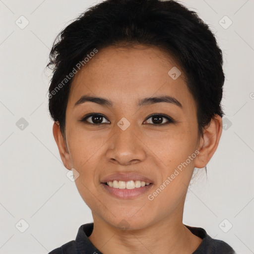 Joyful asian young-adult female with short  black hair and brown eyes