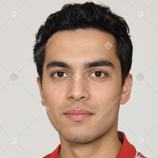 Neutral latino young-adult male with short  black hair and brown eyes