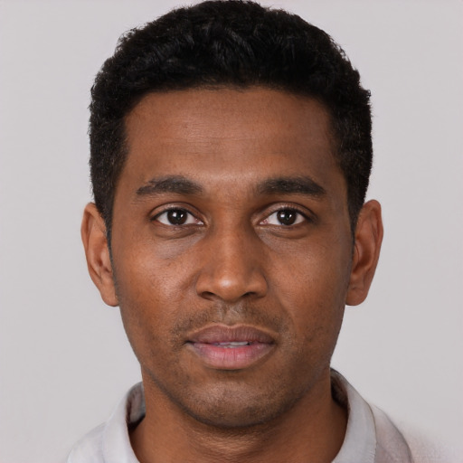 Neutral black young-adult male with short  black hair and brown eyes