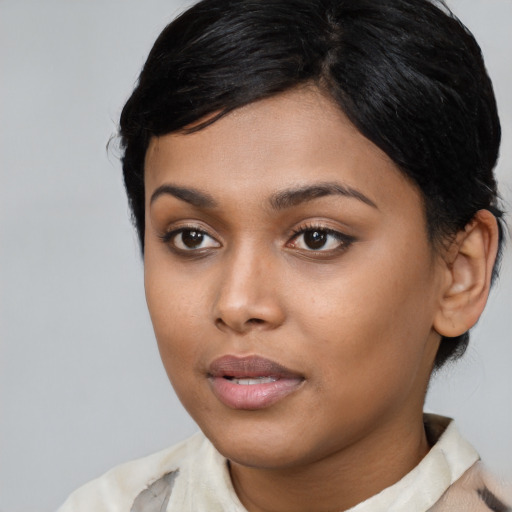 Neutral asian young-adult female with medium  black hair and brown eyes