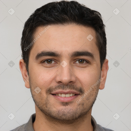 Joyful white young-adult male with short  black hair and brown eyes