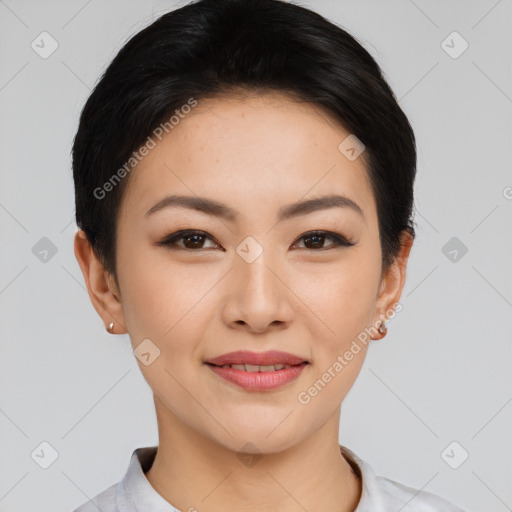 Joyful asian young-adult female with short  black hair and brown eyes