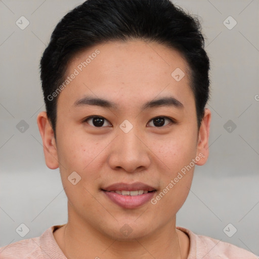 Joyful asian young-adult male with short  brown hair and brown eyes