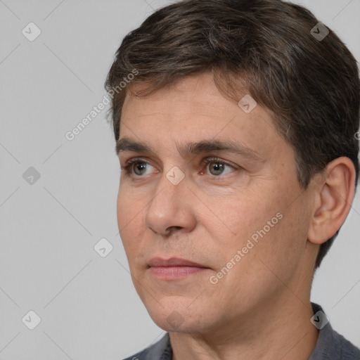 Neutral white adult male with short  brown hair and brown eyes