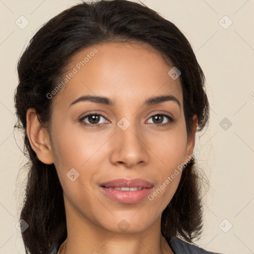 Joyful latino young-adult female with medium  brown hair and brown eyes