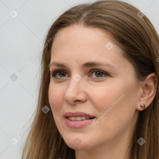 Joyful white young-adult female with long  brown hair and grey eyes