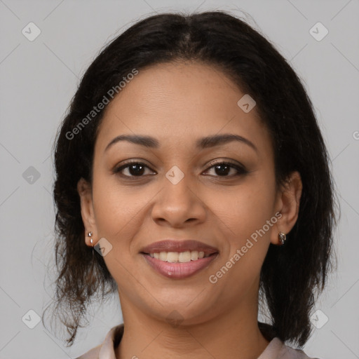 Joyful latino young-adult female with medium  brown hair and brown eyes