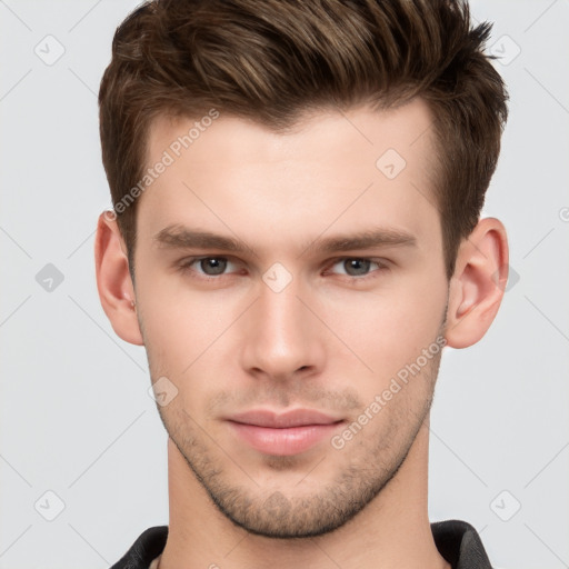 Neutral white young-adult male with short  brown hair and brown eyes