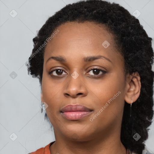 Joyful black young-adult female with medium  black hair and brown eyes