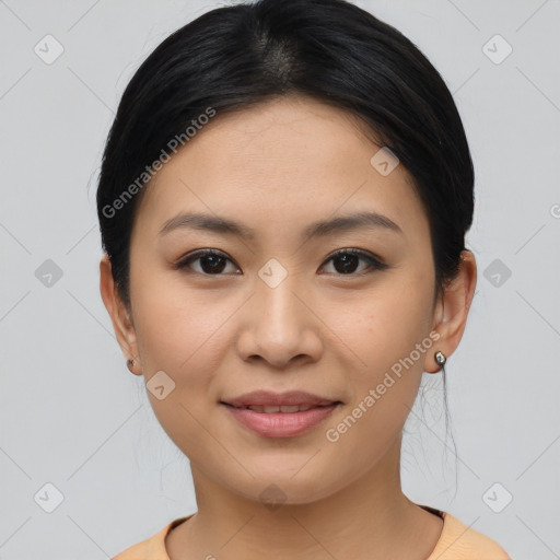 Joyful asian young-adult female with medium  brown hair and brown eyes