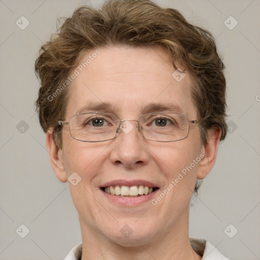 Joyful white adult female with short  brown hair and green eyes