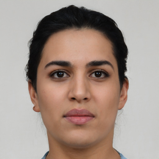 Neutral latino young-adult female with short  black hair and brown eyes